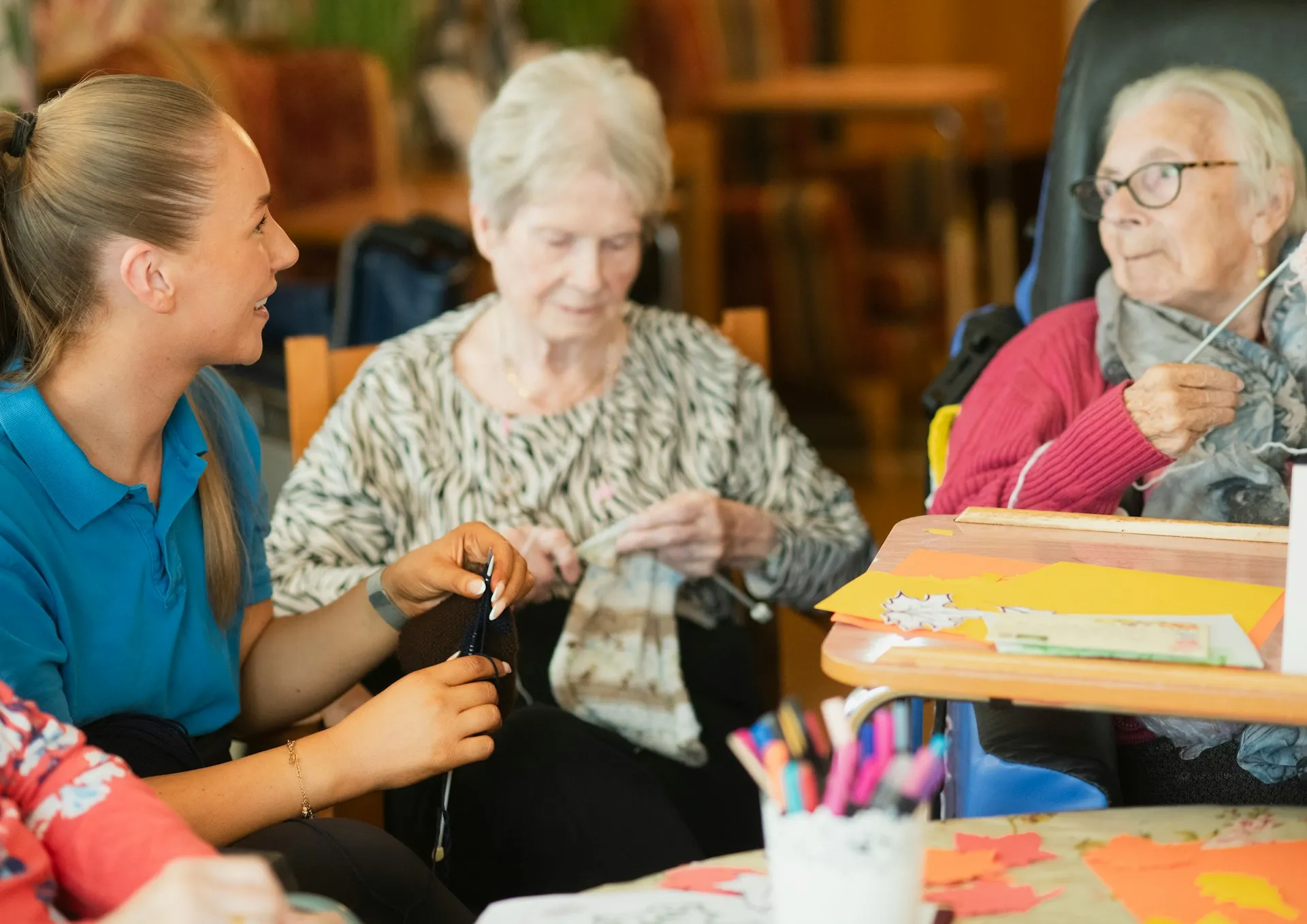 A Nurses & Company caregiver with an older adult receiving dementia care at home